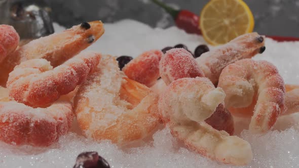 Frozen Fresh Shrimps on the Snow at the Seafood Market