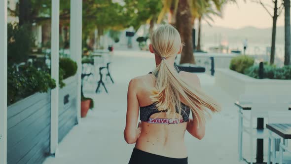 Sport Woman Jogging in Comfortable Gym Yoga Set Outdoor