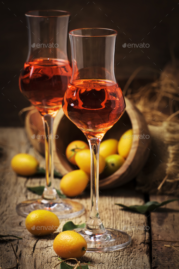 kumquat liqueur Stock Photo by Olga_Kochina PhotoDune