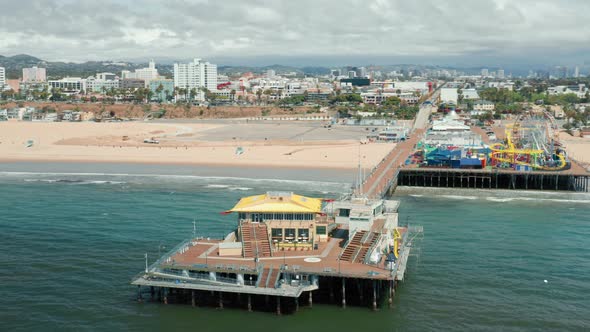 Aerial View of Santa Monica Pier Shoreline on a Sunny Day in Los Angeles, USA alt