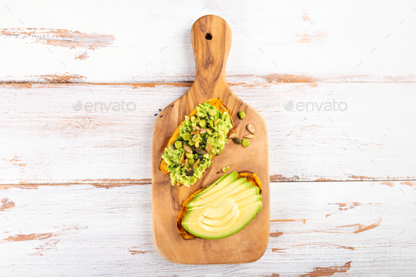 Sweet potato toasts with avocado - Stock Photo - Images