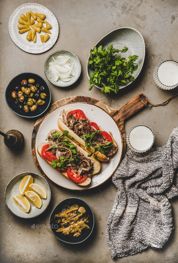 Turkish traditional meat sandwich tantuni with beef, onion and vegetables - Stock Photo - Images