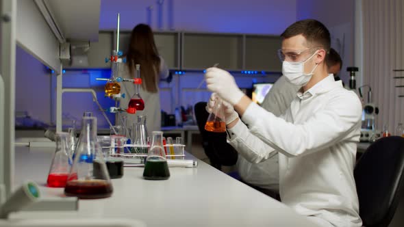 Young Scientist Smiling at Camera