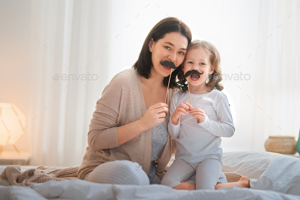 mother and daughter playing - Stock Photo - Images