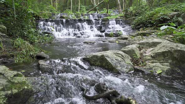 Beautiful stream and waterfall in tropical forest at Namtok Samlan, Saraburi, Thailand