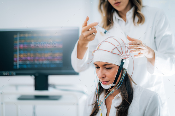 EEG Brainwave Scanning Stock Photo by microgen | PhotoDune