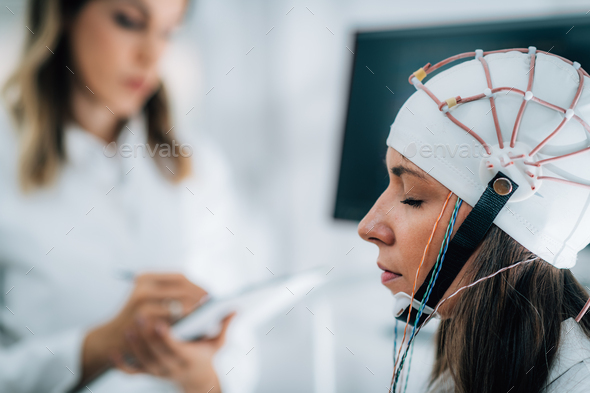 Doctor and Patient in Neuroscience Lab, Doing EEG Scan Stock Photo by ...