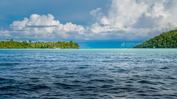 Strait between Kri and Monsuar Island. Raja Ampat, Indonesia, West Papua - Stock Photo - Images