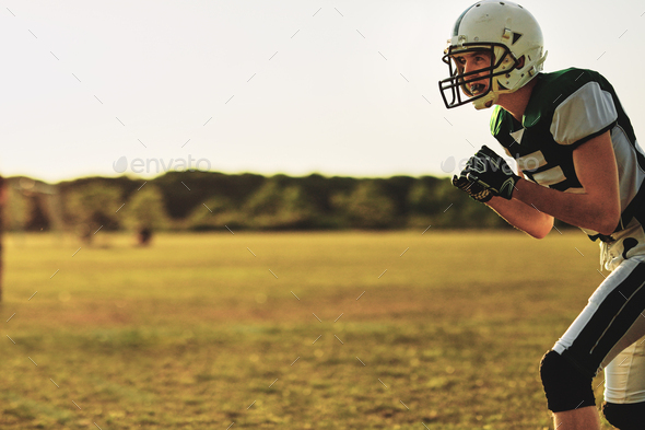 Football receiver waiting for a throw during team practice