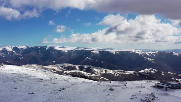 Aerial view at the mountain on a sunny winter day