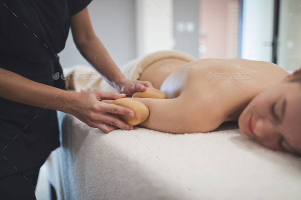 Cliend enjoying massage given by masseur