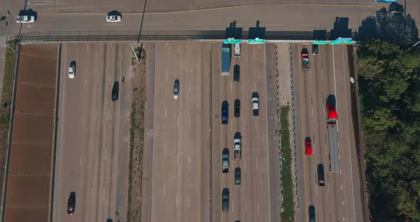 Birds eye view of traffic on 59 South and North freeway near downtown Houston. This video was filmed alt