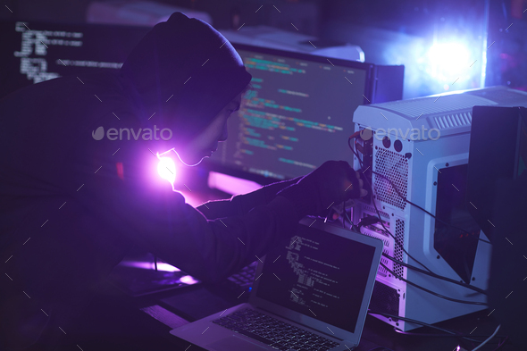 Computer Hacker in Dark