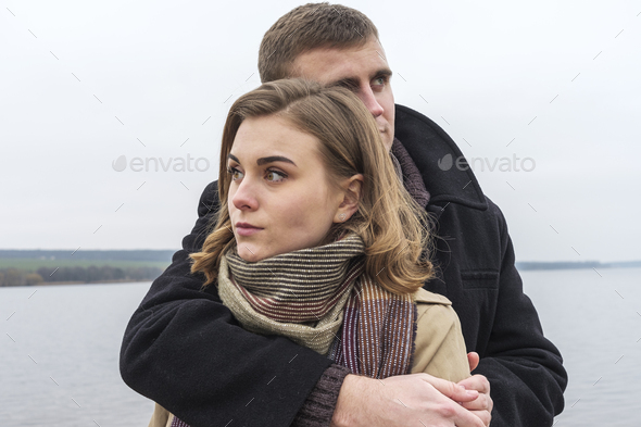 Young couple deeply in love in a close embrace - Stock Photo - Images