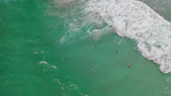 Aerial Drone Footage of Surfers, Trigg Beach, Perth, Western Australia at sunset