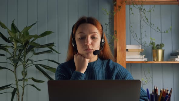 Confident Happy Caucasian Businesswoman Holding Video Call Online Meeting with Colleagues
