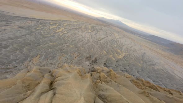 Factory Butte FPV Drone flyby in the hills and canyons. alt