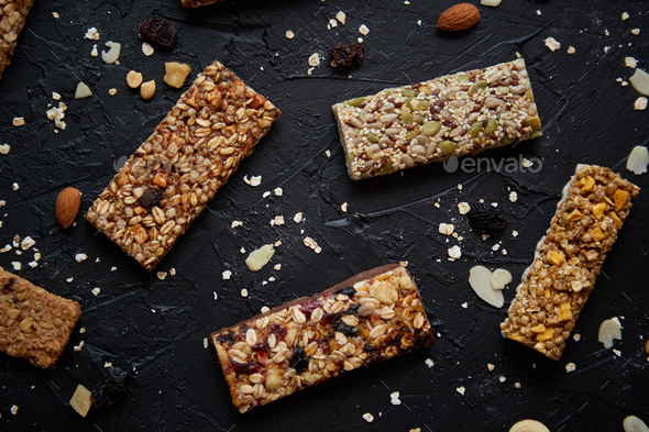 Homemade gluten free granola bars with mixed nuts, seeds, dried fruits