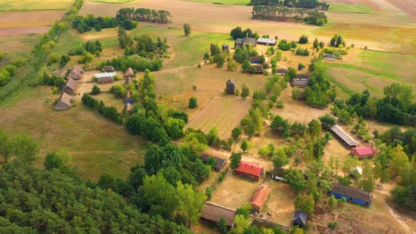 Maurzyce wooden architecture heritage park, antique building in open air museum. Aerial Lowicz, Poln alt