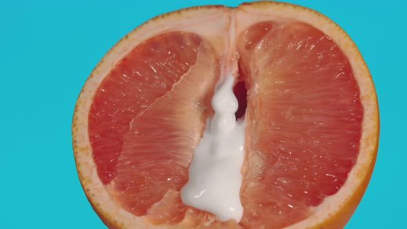Concept of Unprotected Sex Disguised As Greyfruit in Form of Vagina and Clitoris on Which White alt
