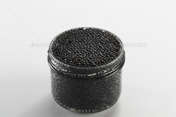 Download Black Caviar In A Jar On A Neutral Background Stock Photo By Oleghz