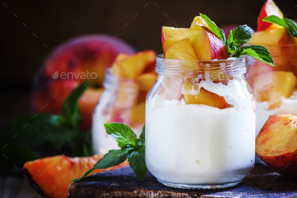 Dessert with sweet peaches, cottage cheese and whipped cream