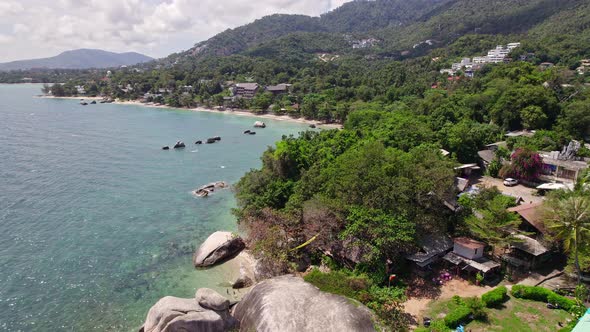 Beautiful 4K drone footage of the beach and unique rock features at Hin Ta Hin Yai Beach on Koh Samu alt
