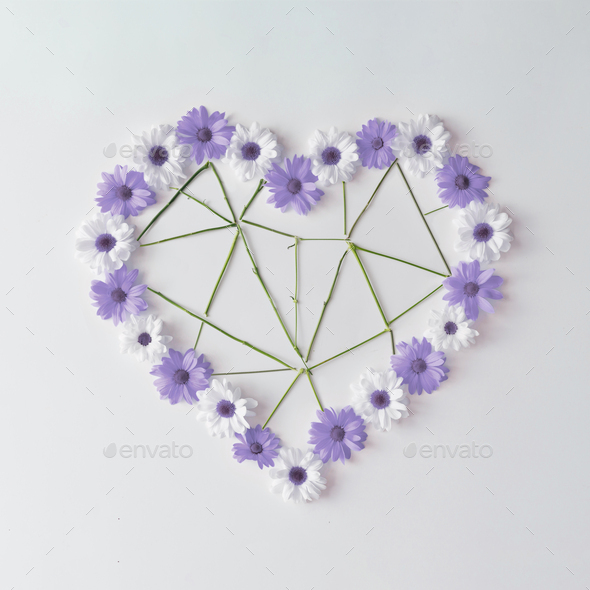 Heart shape made of violet and white daisies with low poly flower stems.