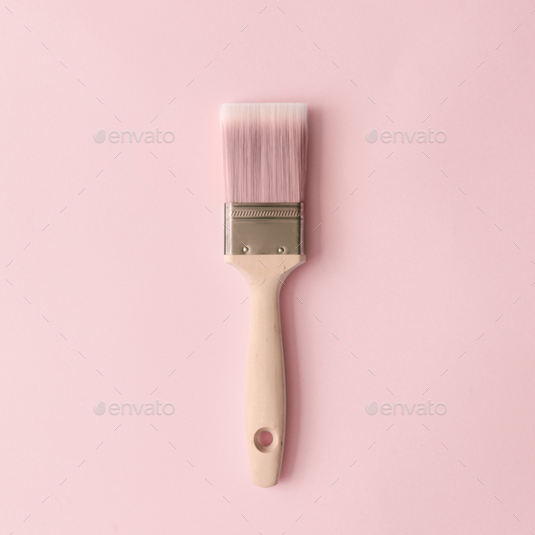 Creative concept made with paint brush and pastel pink background. Minimal  flat lay. Stock Photo by zamurovic