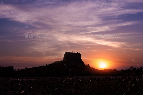 Sunset silhouette of Lion Rock. Sigiriya, Sri Lanka - Stock Photo - Images