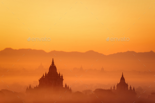 Ancient Buddhist Temples of Bagan Kingdom at sunrise. Myanmar (Burma) - Stock Photo - Images