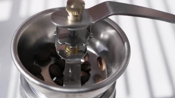 Pouring Coffee Bean In Grinder