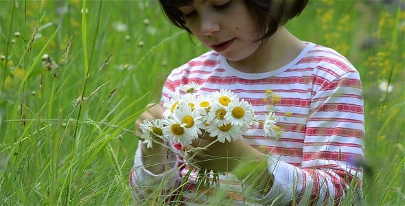 Girl Playing With Daisy 1