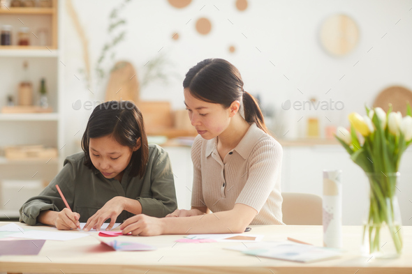 Girls Creating Something For Mother
