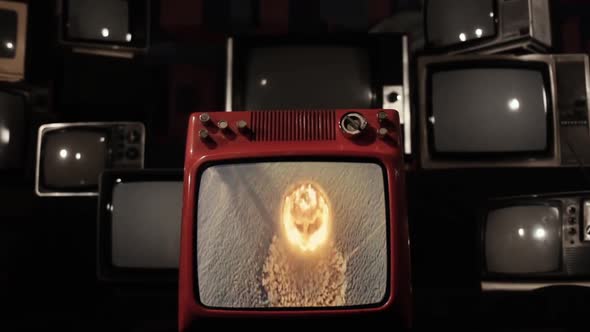 Aerial View of an Atomic Test on a Retro Television. alt