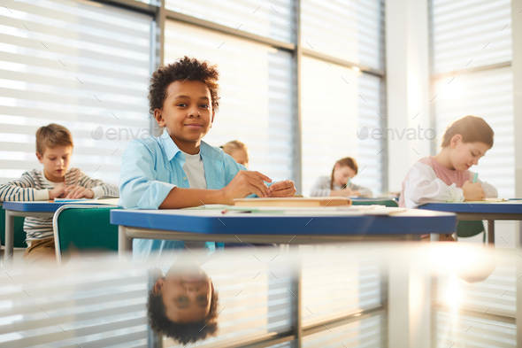 Boy Looking At Camera During Lesson