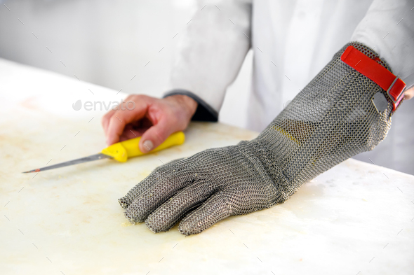 Chain mail metal butchers protective glove Stock Photo by Photology75