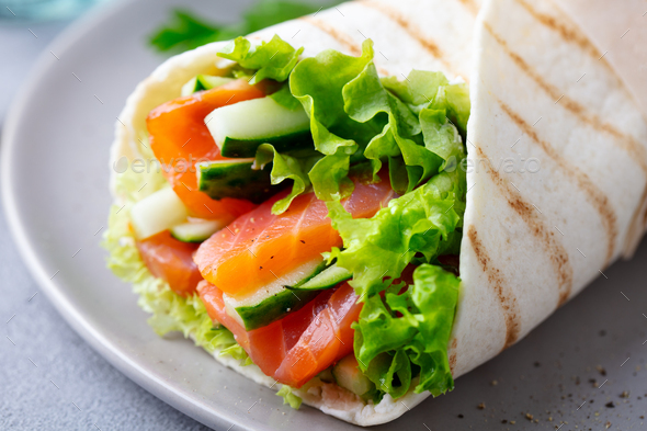 Download Wrap Sandwich, Roll with Fish Salmon and Vegetables. Grey Background. Close up. Stock Photo by ...