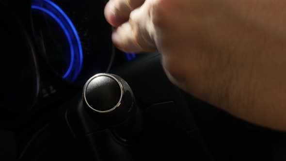 Giving turn signal on switch in modern car 4K video alt