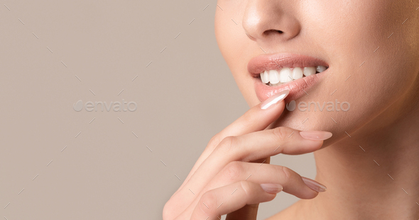 Unrecognizable Woman Smiling Touching Lips Posing, Studio Shot, Cropped