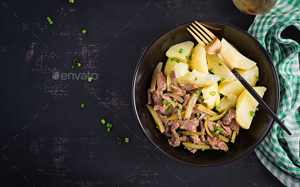 Stew beef, pieces of beef stewed with pickled cucumber in russian style. - Stock Photo - Images