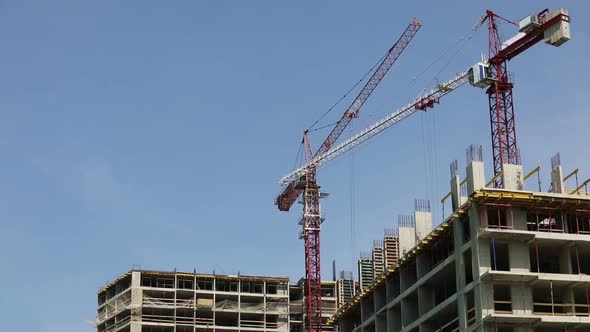 Construction Crane at Building Construction Site
