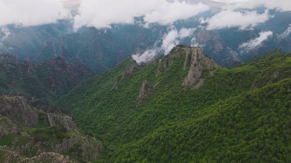 Rocky Mountain Pinnacales Covered with Green Grass alt
