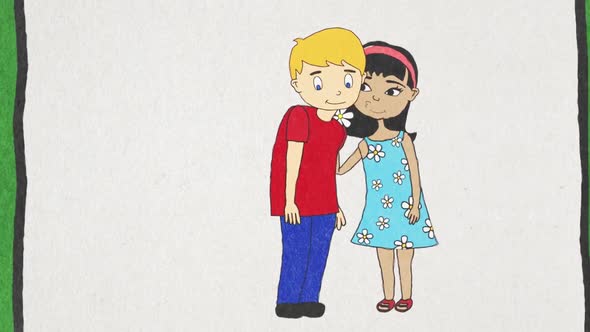 Girl kissing a boy on his cheek after getting a flower alt