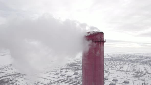White Smoke From A Chimney On A Winter Background alt
