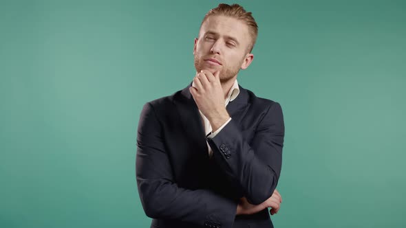 Thinking Businessman Looking Up and Around on Blue Background alt