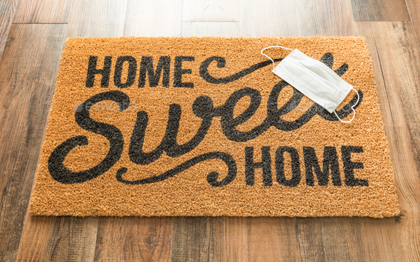 Download One Medical Face Mask Rests On Home Sweet Home Welcome Mat Amidst The Coronavirus Pandemic Stock Photo By Andy Dean Photog