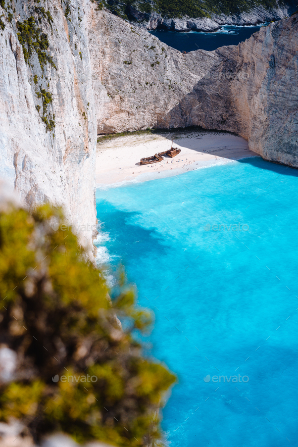 Shipwreck on Navagio beach. Azure turquoise sea water and paradise sandy beach. Famous tourist - Stock Photo - Images