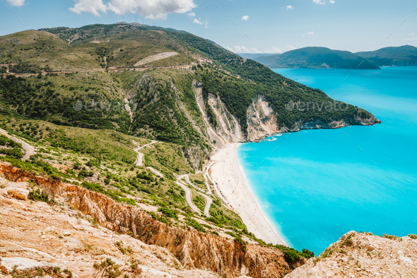 Famous Myrtos Beach at sunny summer day. Tourism visiting destination on Kefalonia island, Greece - Stock Photo - Images