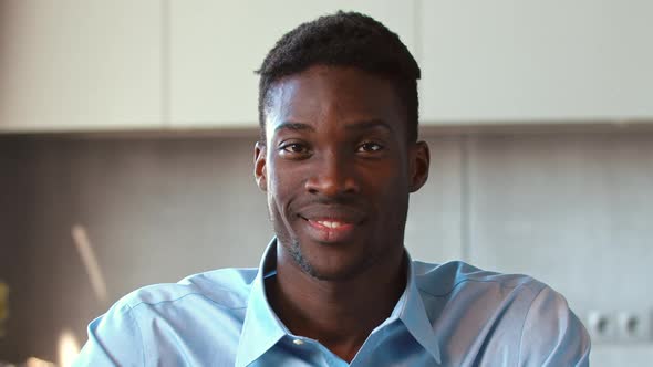 Portrait of a smiling man looking at camera, slow motion alt